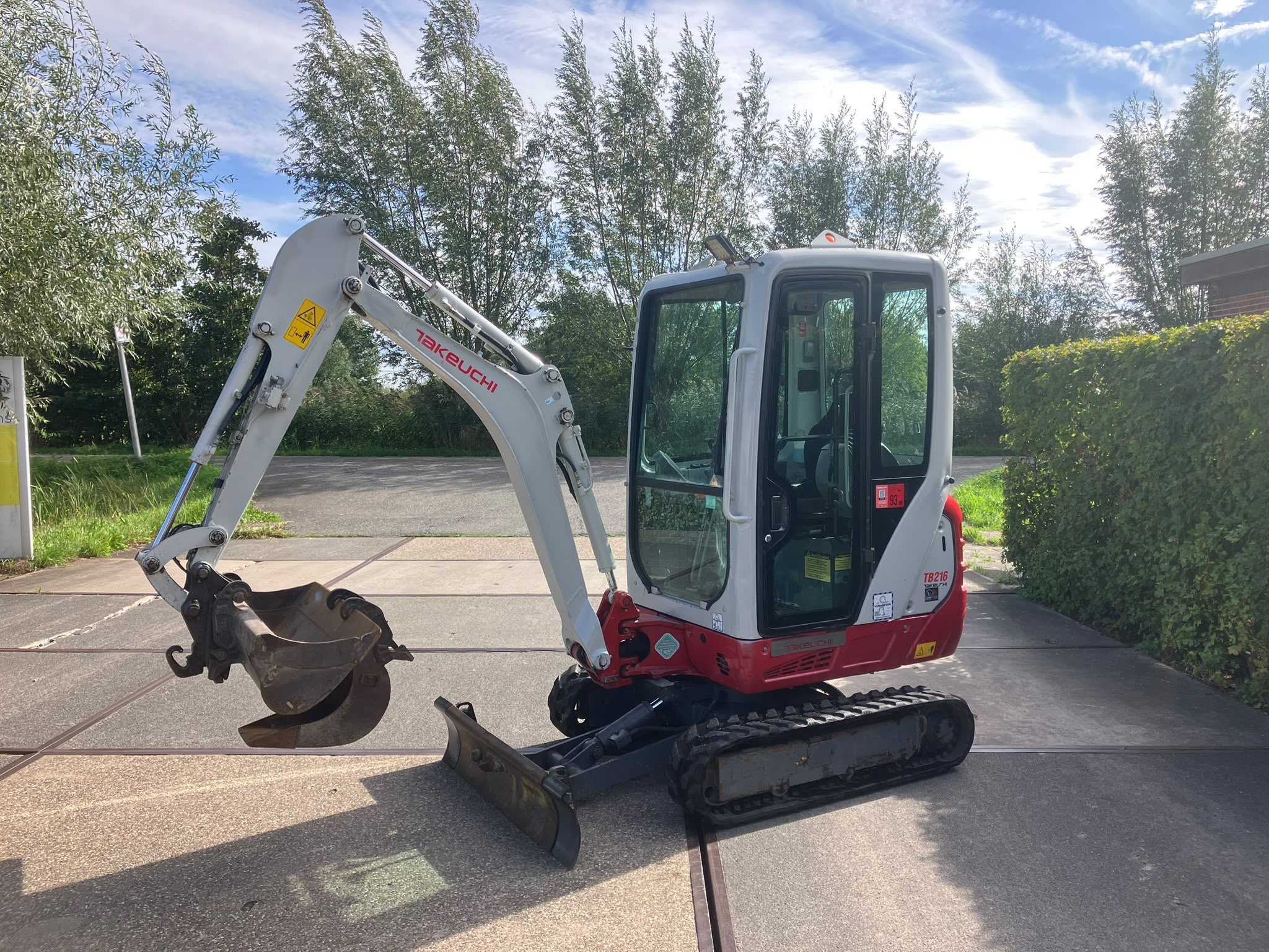 Takeuchi TB216 met cabine
